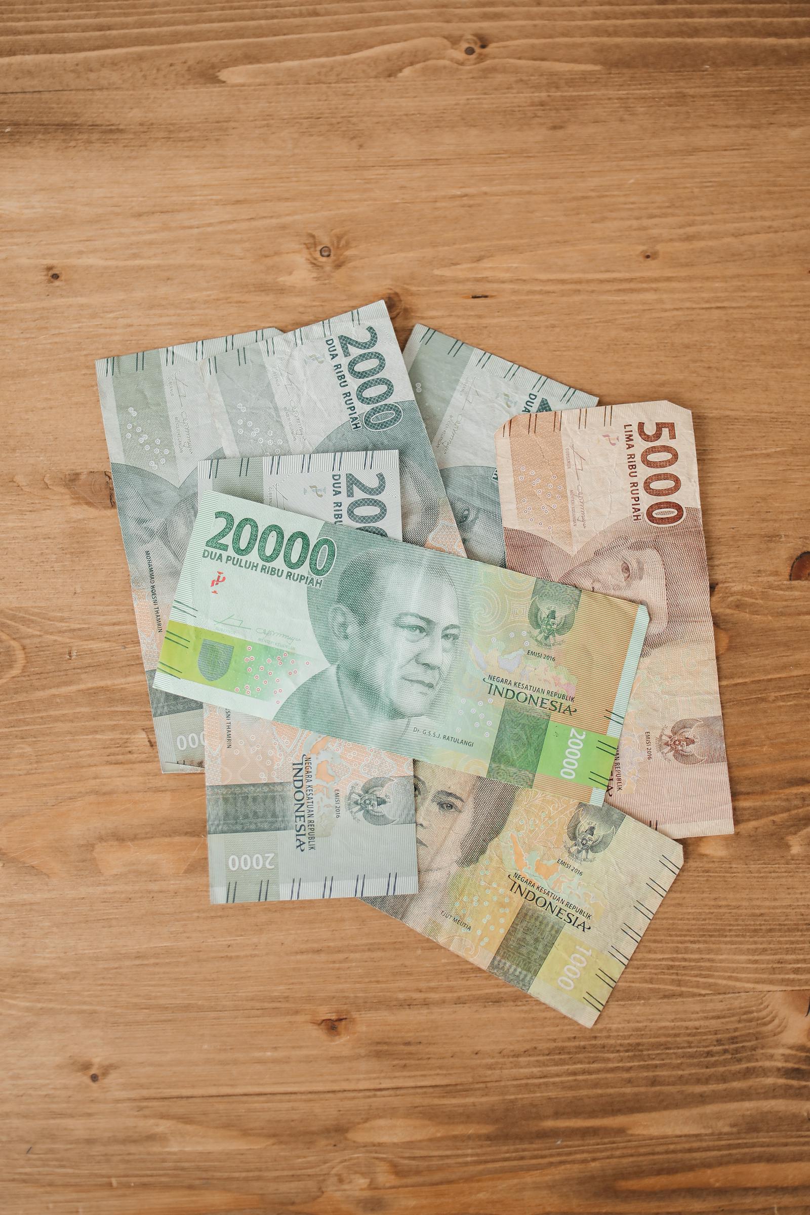Indonesian money is on a wooden table