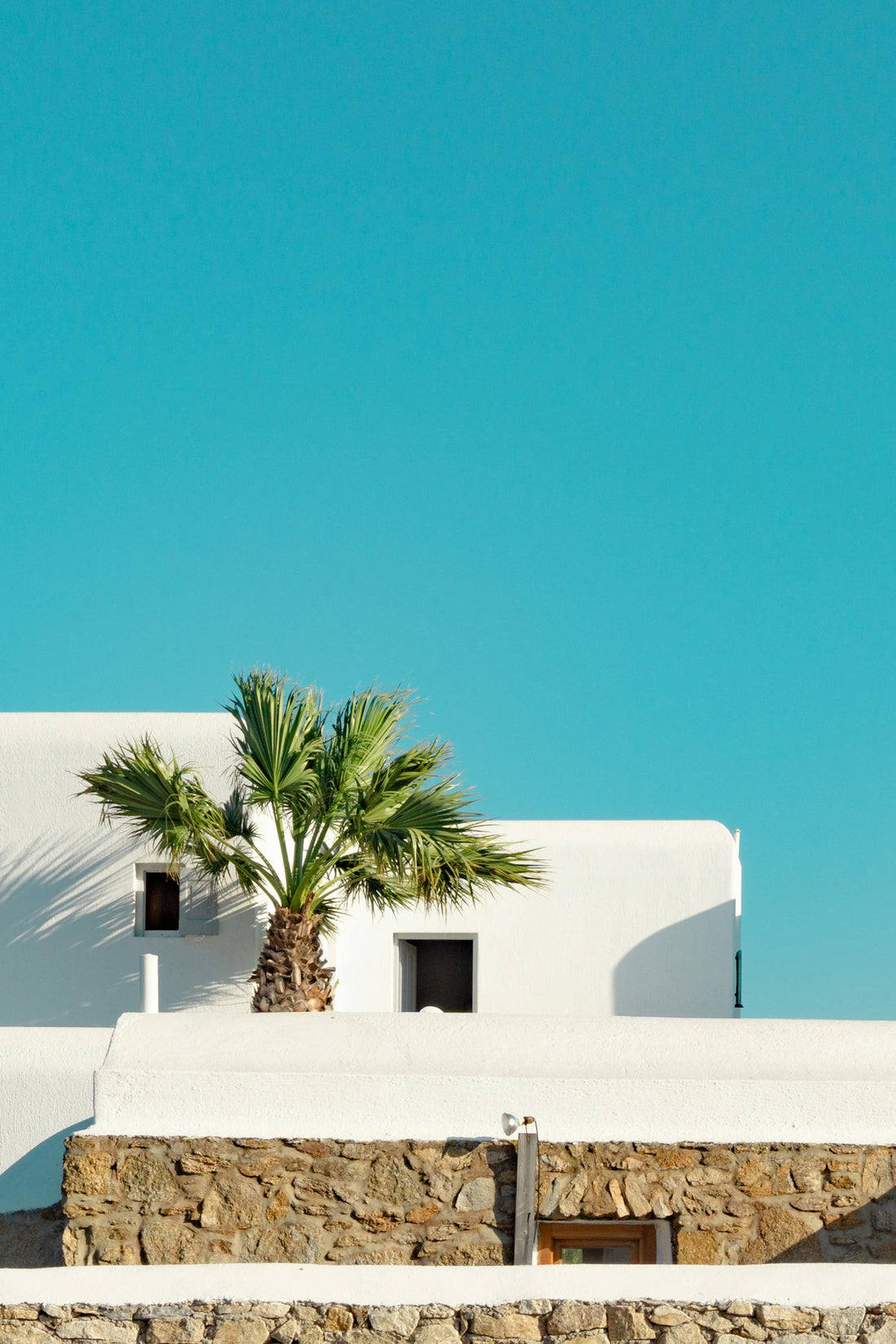Simple buildings and bright sky in Mikonos Greece