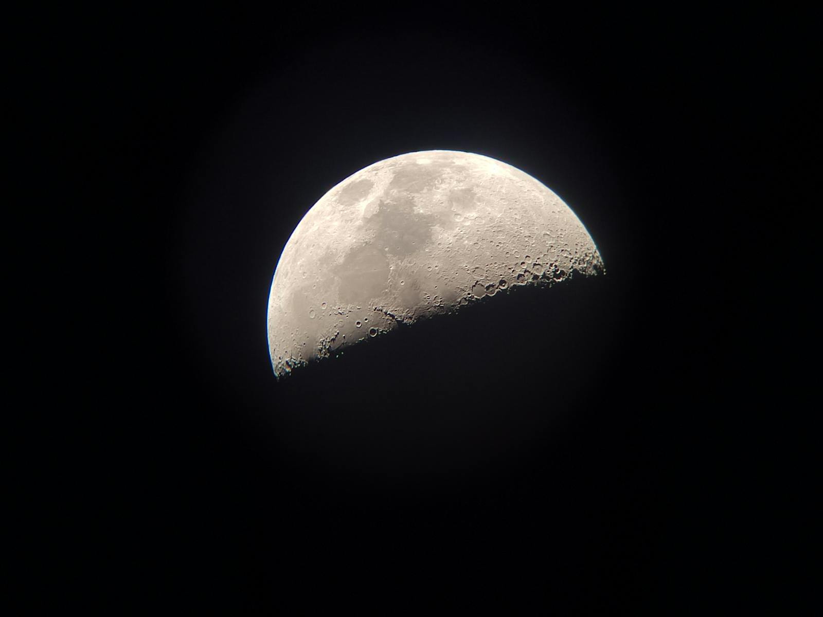 Half moon in night sky over Costa Rica