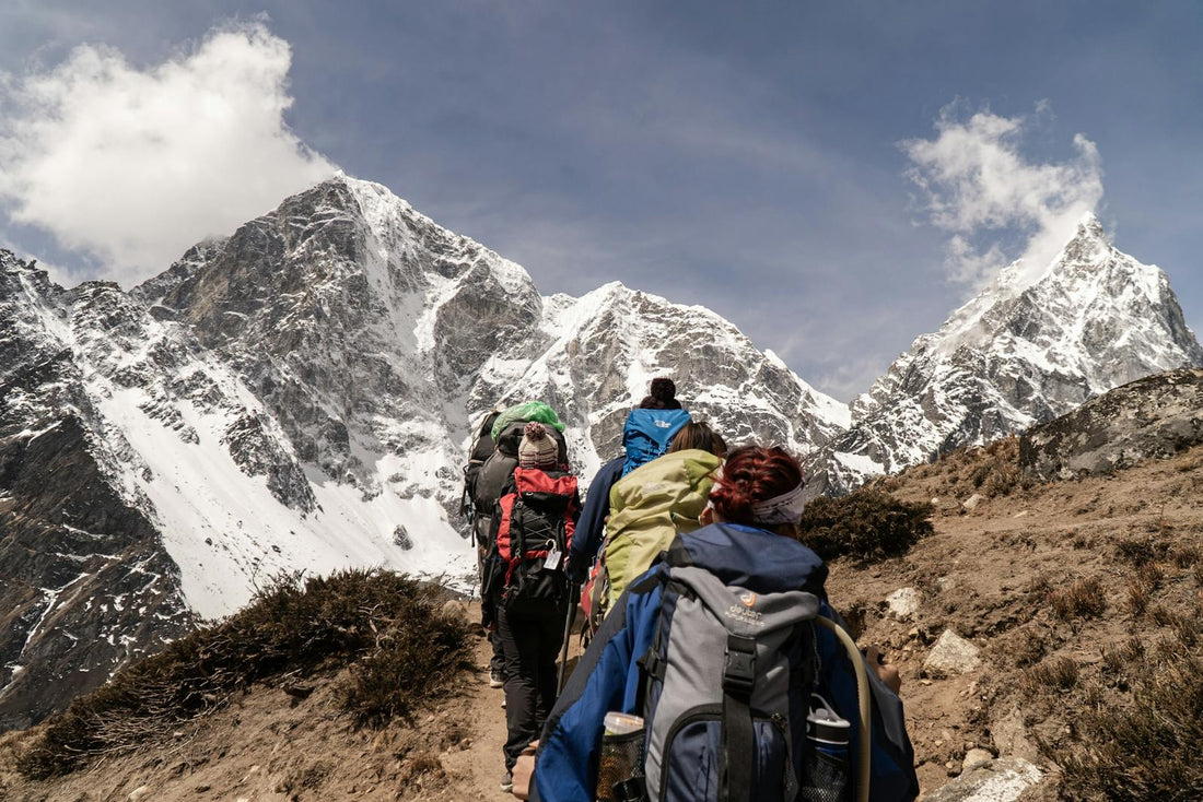 Hiking near snow capped mountains
