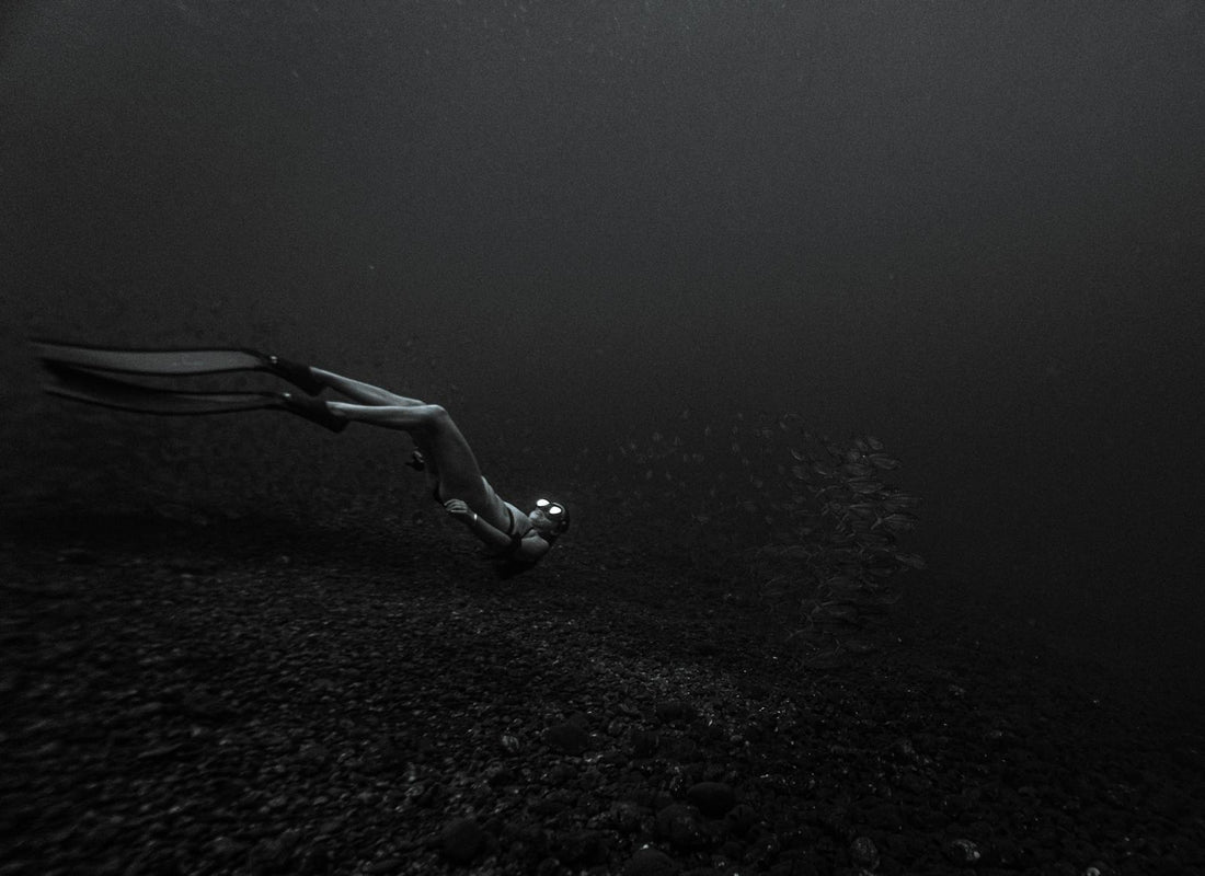 Lone diver explores deep underwater