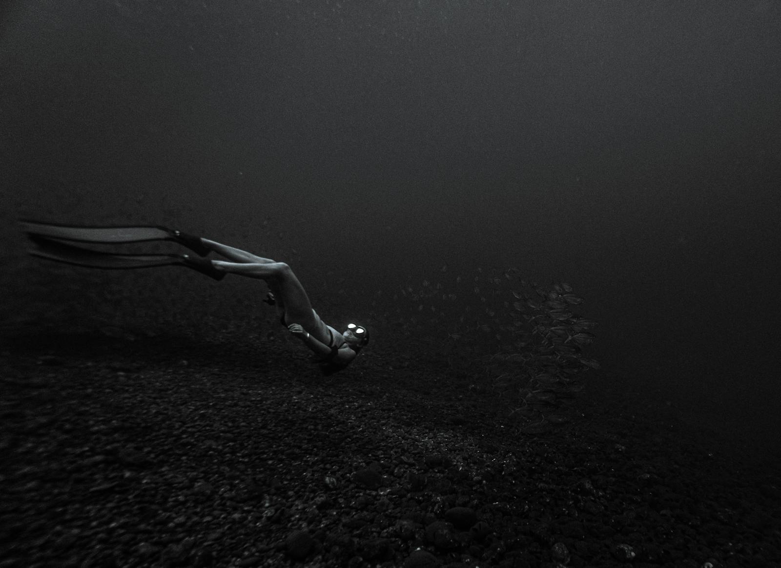Lone diver explores deep underwater